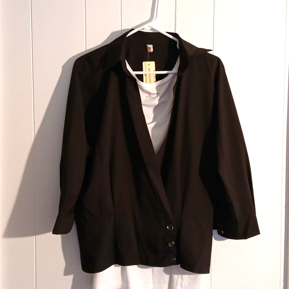 Black cross over button over top